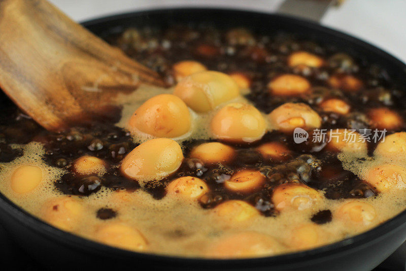Close Up Semur Telur Puyuh  is Boiled Eggs Cook with Soy Sauce for Family Menu